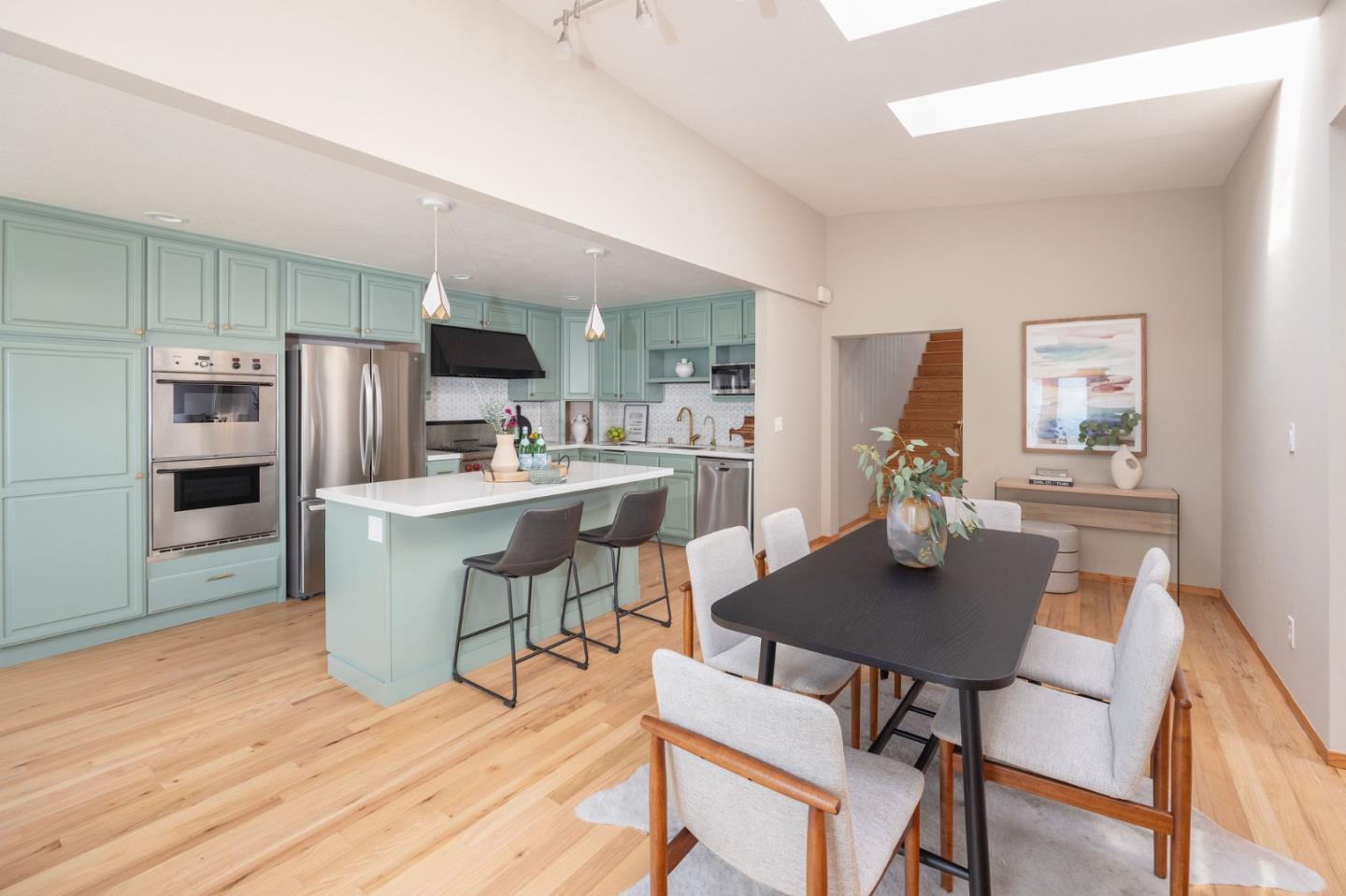 1160 Cedar Street Montara, CA 94037 - Photo 6 of 56 a view of a dining room with furniture and wooden floor