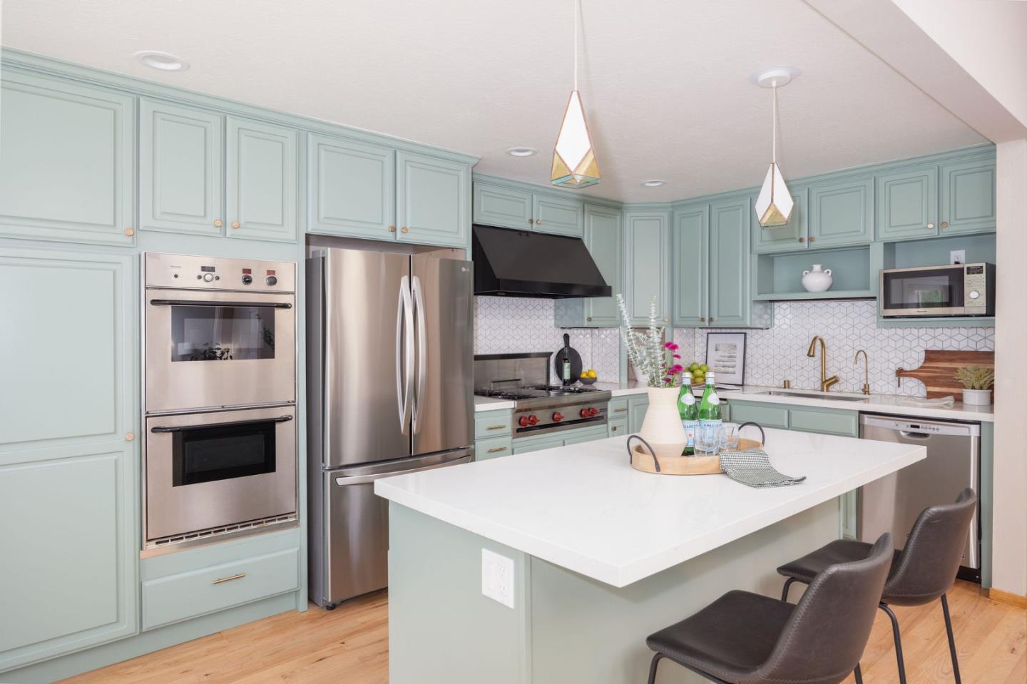 1160 Cedar Street Montara, CA 94037 - Photo 7 of 56 a kitchen that has a lot of cabinets a sink and appliances