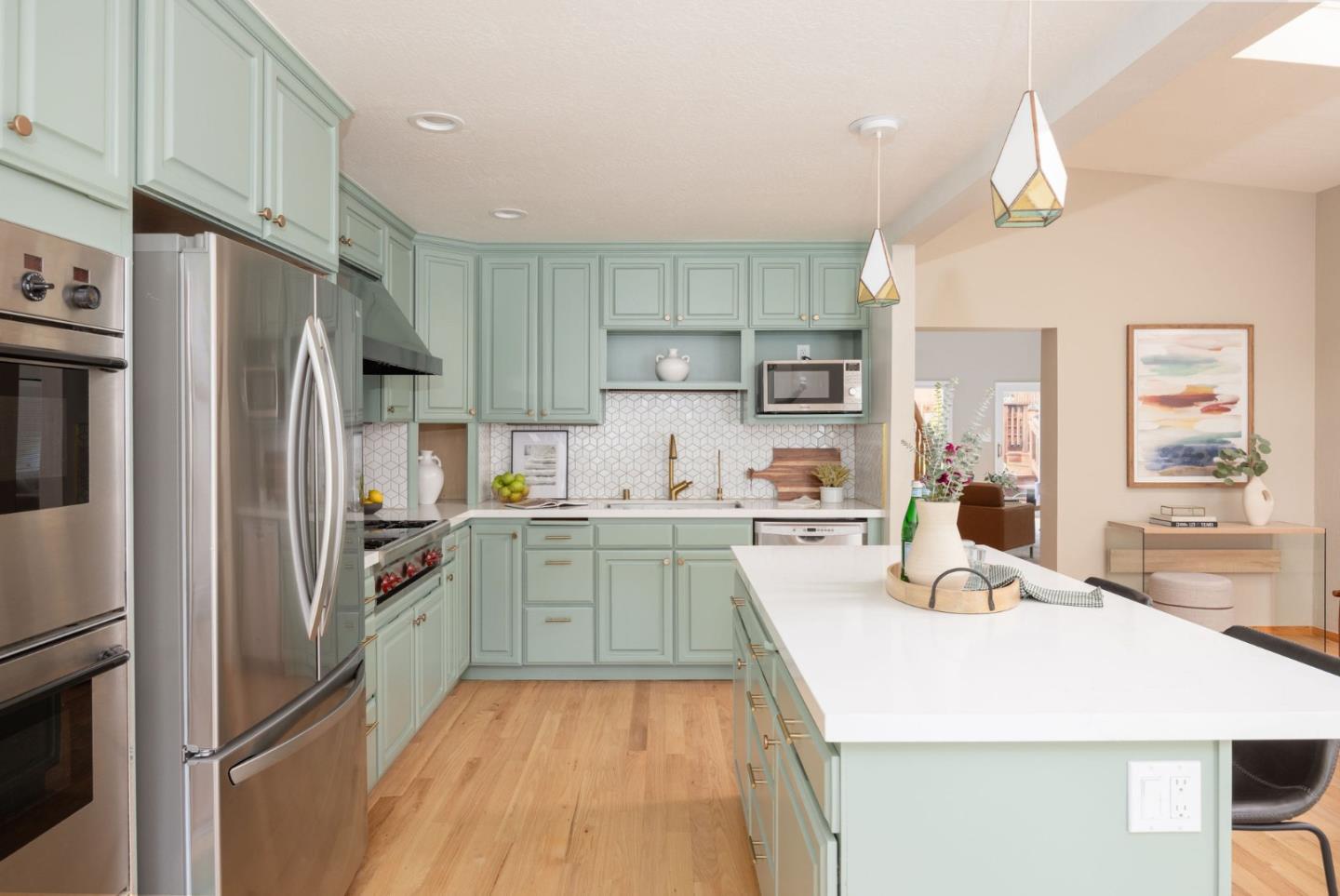 1160 Cedar Street Montara, CA 94037 - Photo 8 of 56 a kitchen with a refrigerator a sink a stove top oven a counter space and cabinets