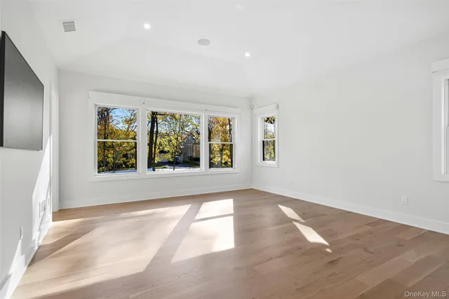 an empty room with windows