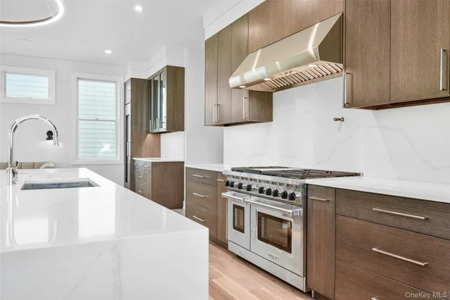 a kitchen with a stove and a sink