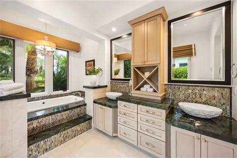 a bathroom with a bathtub and a shower