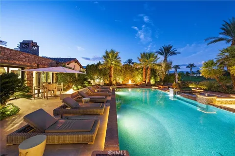 a view of a patio with swimming pool