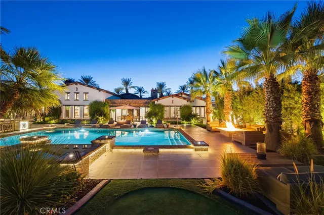 a view of a patio with swimming pool