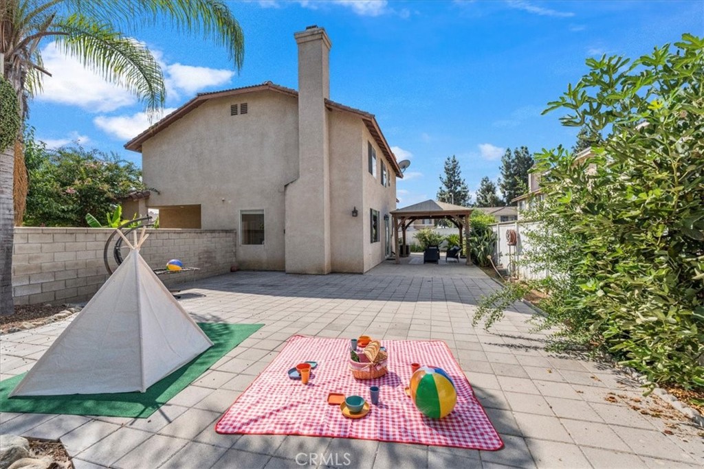 10562 Mustang Circle Montclair, CA 91763 - Photo 15 of 19 a front view of a house with a yard