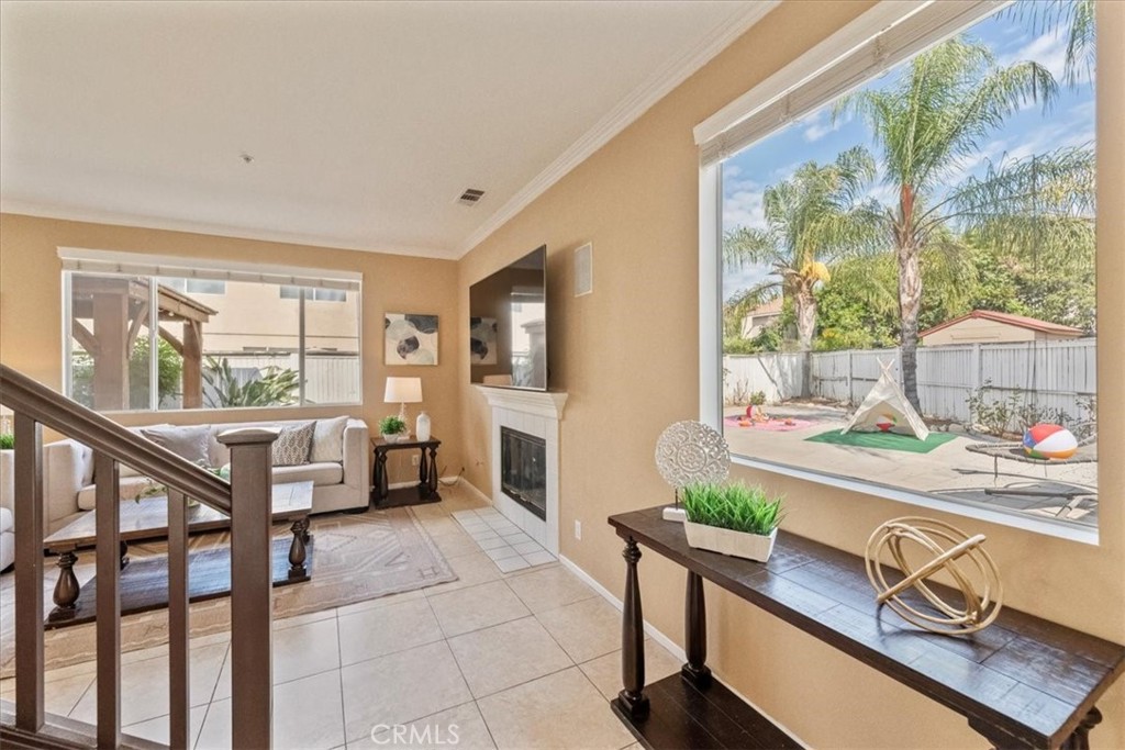 10562 Mustang Circle Montclair, CA 91763 - Photo 3 of 19 a living room with furniture and a table