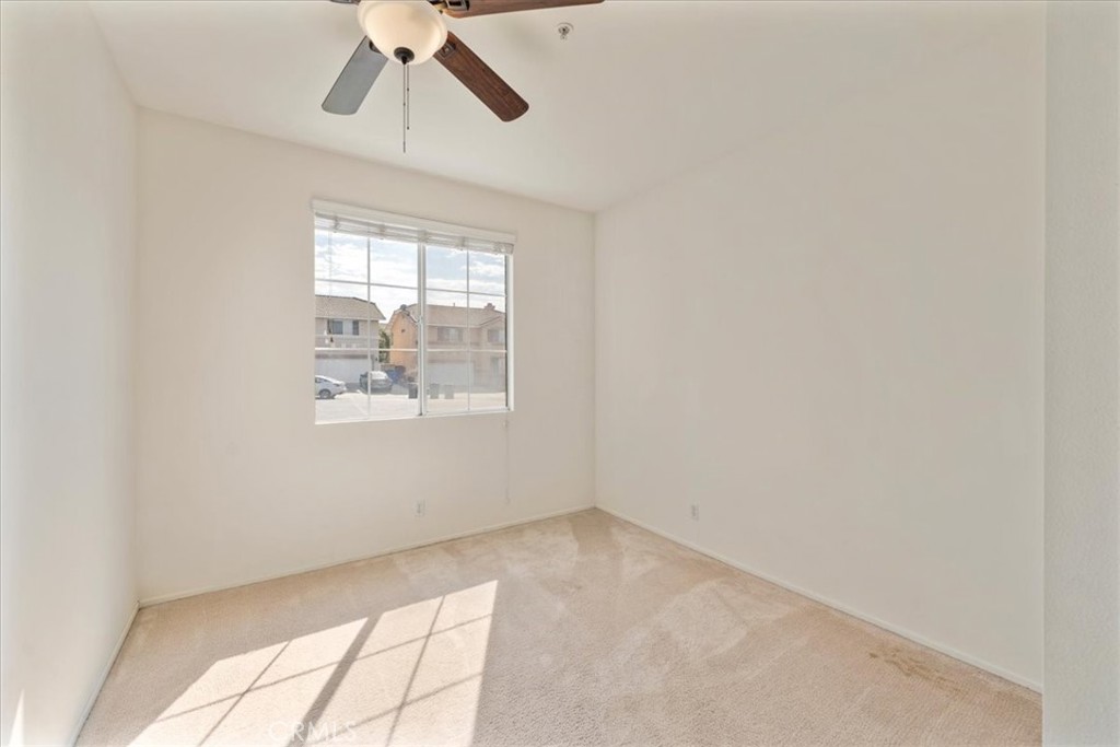 10562 Mustang Circle Montclair, CA 91763 - Photo 7 of 19 an empty room with a window