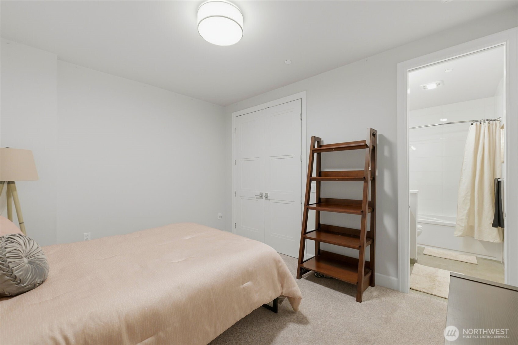 4907 Main Street, Unit 214 Tacoma, WA 98407 - Photo 17 of 34 a bedroom with a bed and a window