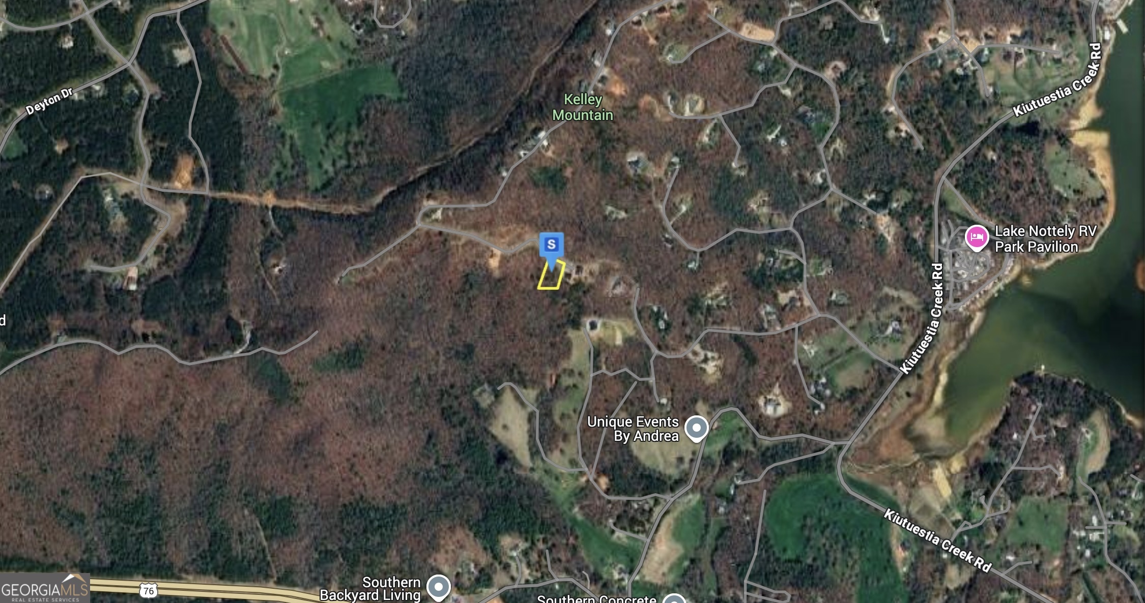 1318 Winding Ridge Blairsville, GA 30512 - Photo 3 of 5 a view of a tree in a backyard