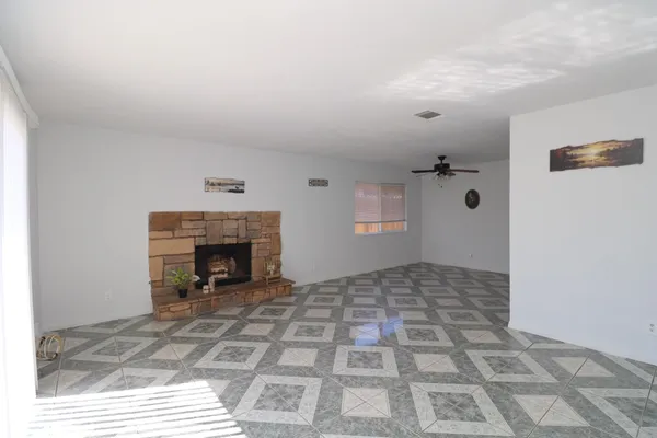 a view of a livingroom with a fireplace