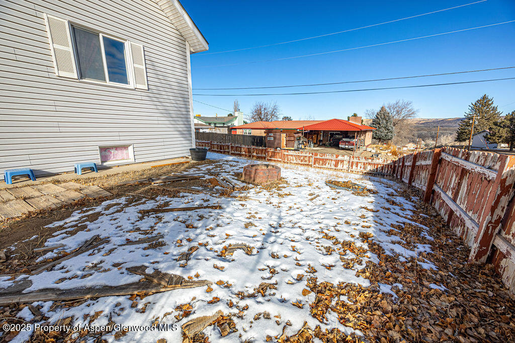 298 Middle Street Rangely, CO 81648 - Photo 55 of 75 a view of a house with a yard