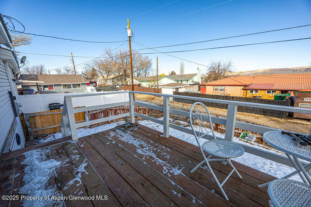 298 Middle Street Rangely, CO 81648 - Photo 59 of 75 a view of a balcony with wooden floor