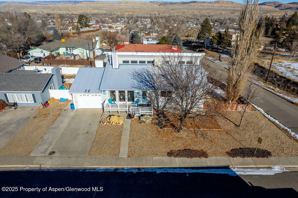 298 Middle Street Rangely, CO 81648 - Photo 62 of 75 an aerial view of residential houses with outdoor space