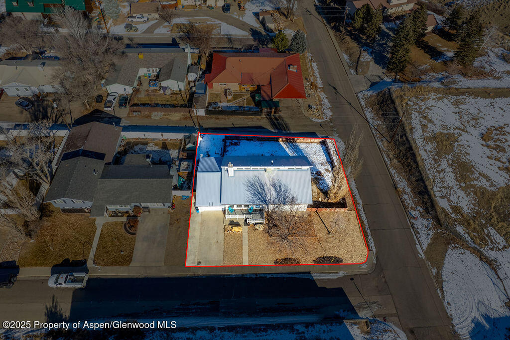 298 Middle Street Rangely, CO 81648 - Photo 73 of 75 an aerial view of residential houses with outdoor space
