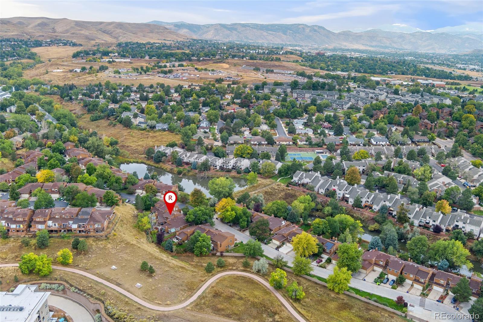92 Ward Court Lakewood, CO 80228 - Photo 1 of 37 an aerial view of residential houses with outdoor space and trees