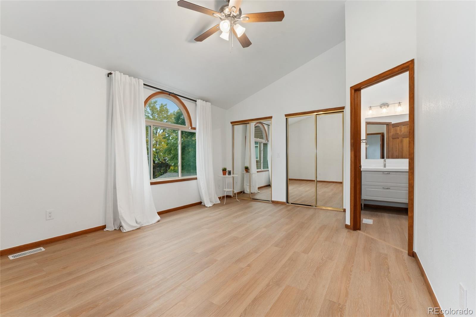 92 Ward Court Lakewood, CO 80228 - Photo 20 of 37 a view of an empty room with a window