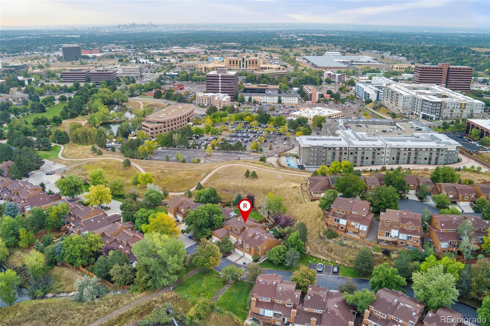92 Ward Court Lakewood, CO 80228 - Photo 33 of 37 an aerial view of a house with a lake view