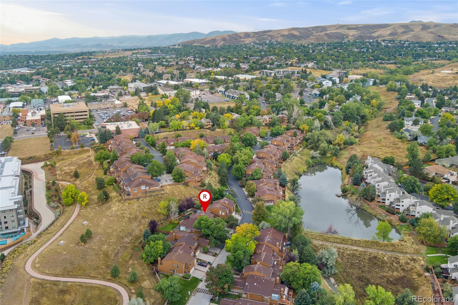 92 Ward Court Lakewood, CO 80228 - Photo 34 of 37 an aerial view of residential houses with outdoor space and trees