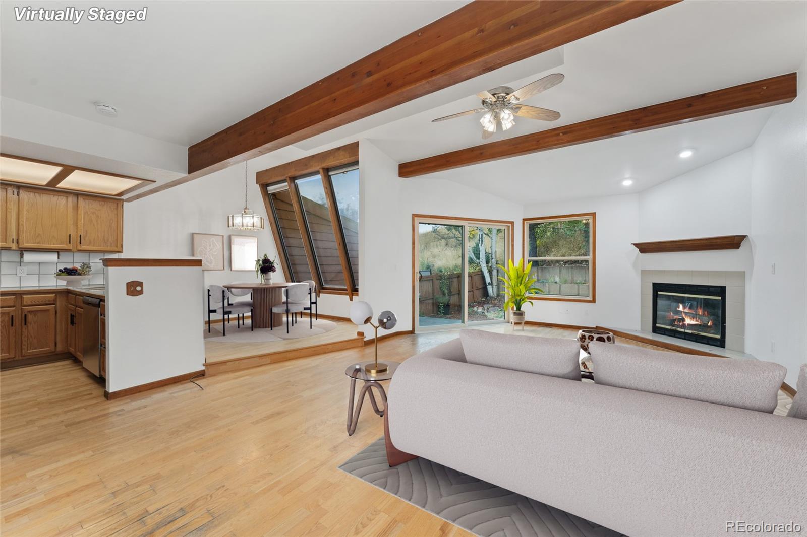 92 Ward Court Lakewood, CO 80228 - Photo 5 of 37 a living room with furniture large window and flat screen tv