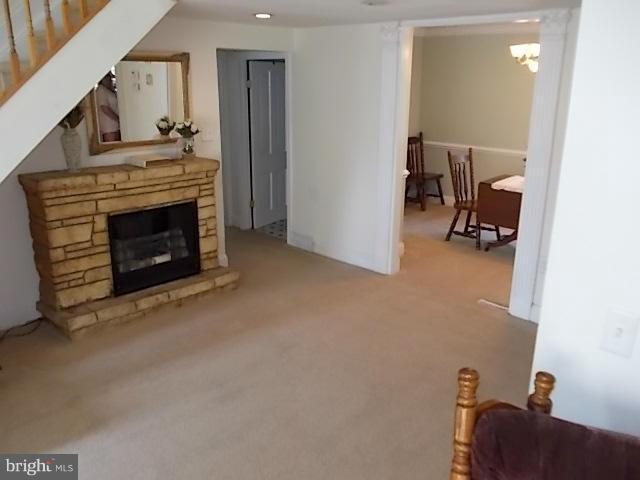 1203 Edgewood Road Edgewood, MD 21040 - Photo 11 of 27 a living room with furniture and a fireplace