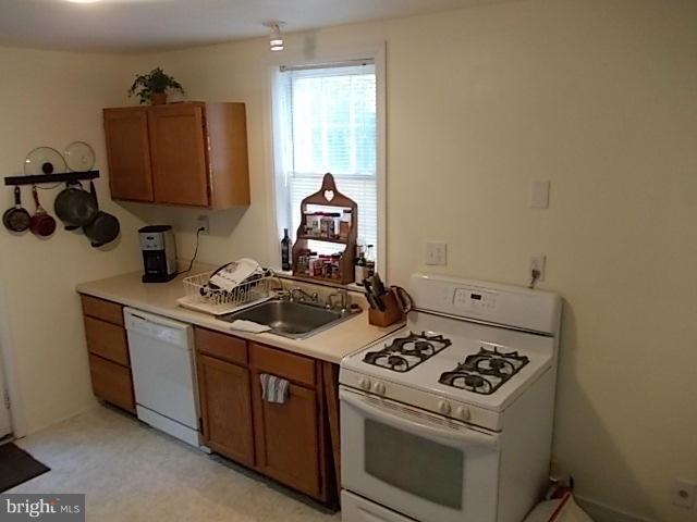 1203 Edgewood Road Edgewood, MD 21040 - Photo 8 of 27 a white stove top oven sitting inside of a kitchen