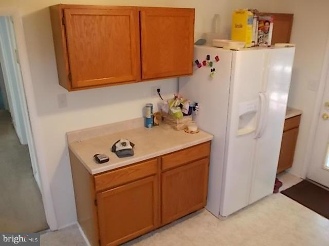 1203 Edgewood Road Edgewood, MD 21040 - Photo 9 of 27 a bathroom with a sink and a refrigerator