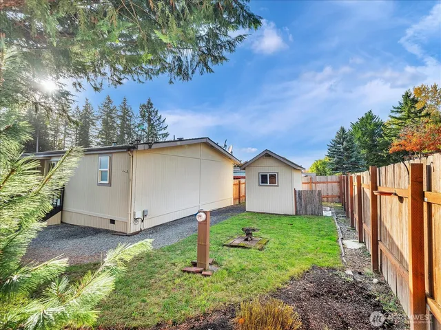 a house view with a garden space