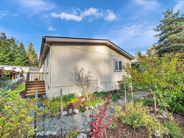 a backyard of a house with lots of green space