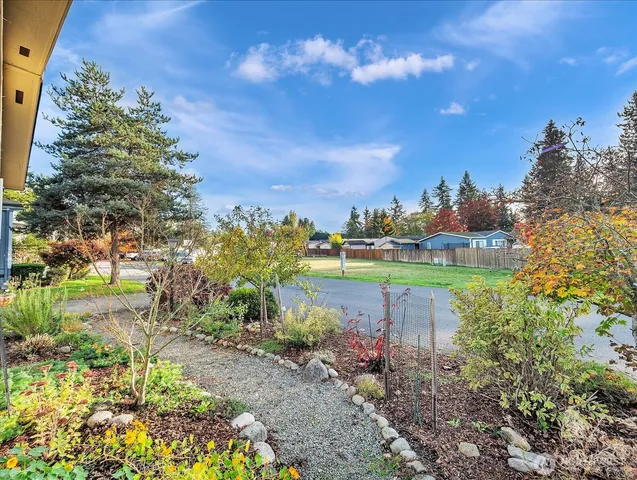 a view of a lake with a building in the background