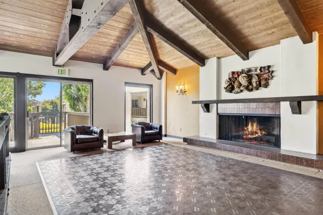a living room with a fireplace
