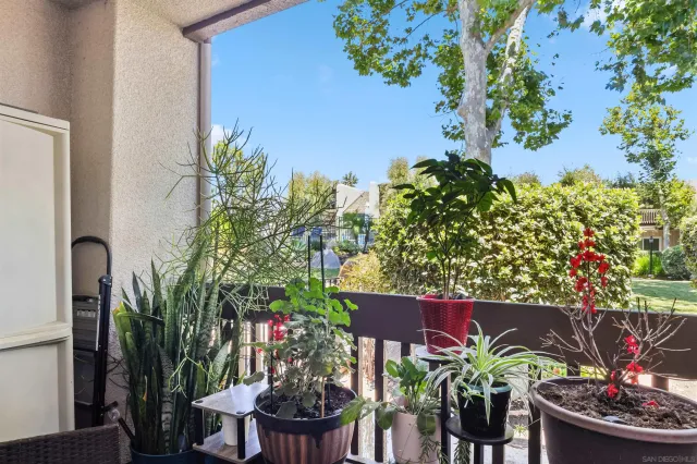 a living room with furniture fireplace and flat screen tv