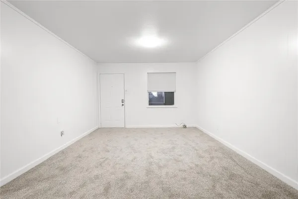 a view of a room with storage and utility room