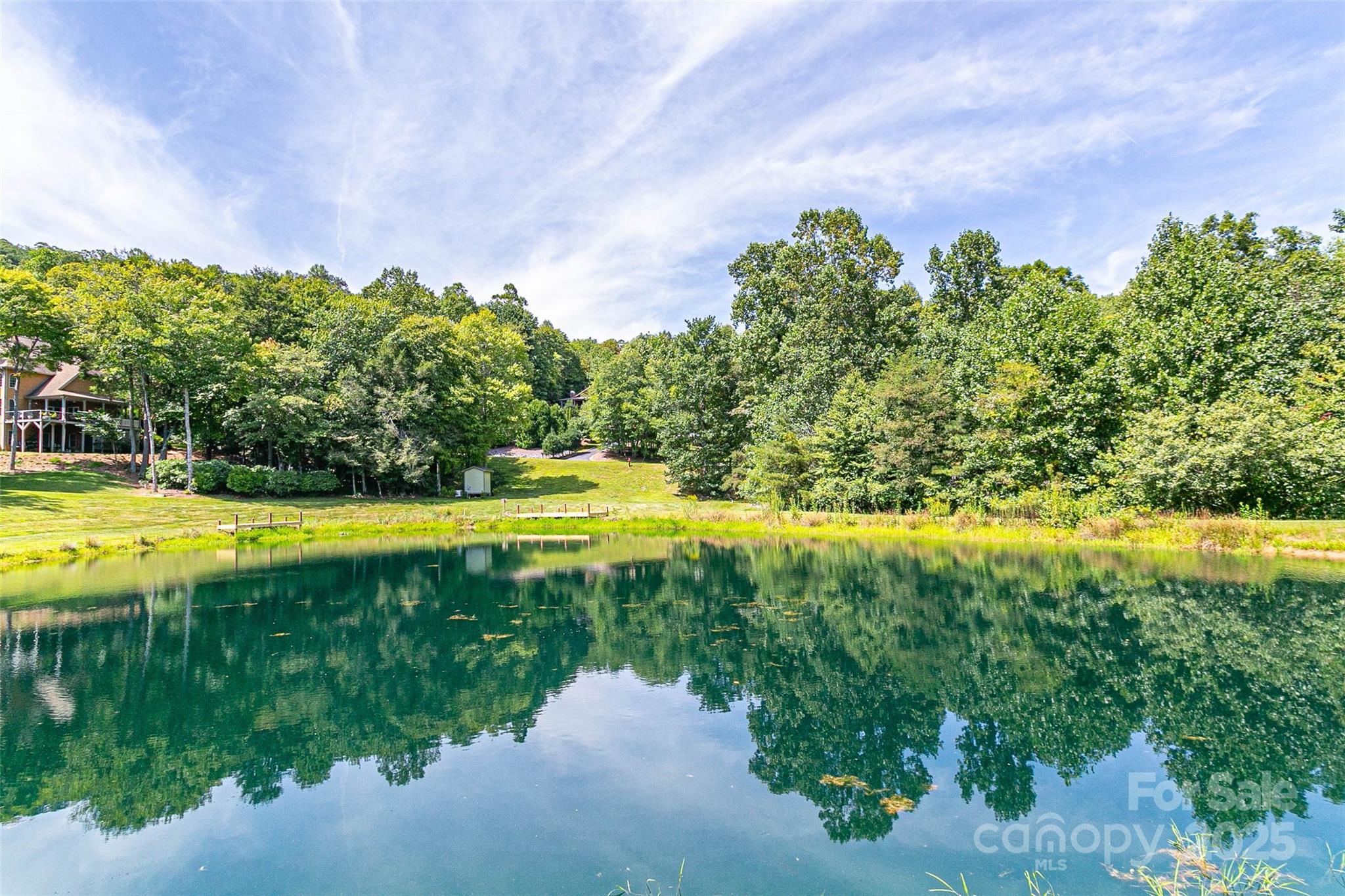 579 Blue Mist Way Arden, NC 28704 - Photo 16 of 20 a view of a swimming pool with an outdoor space and seating area
