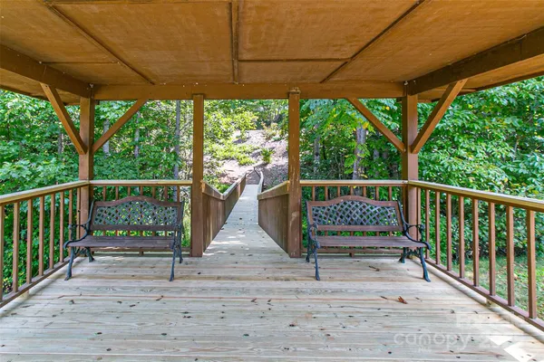 a view of a street with a big yard