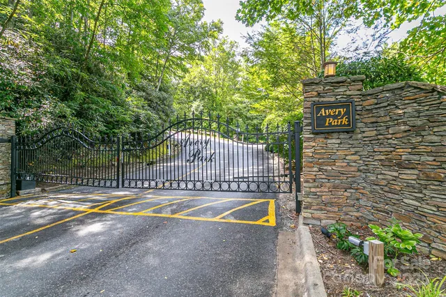 a view of a swimming pool with a backyard