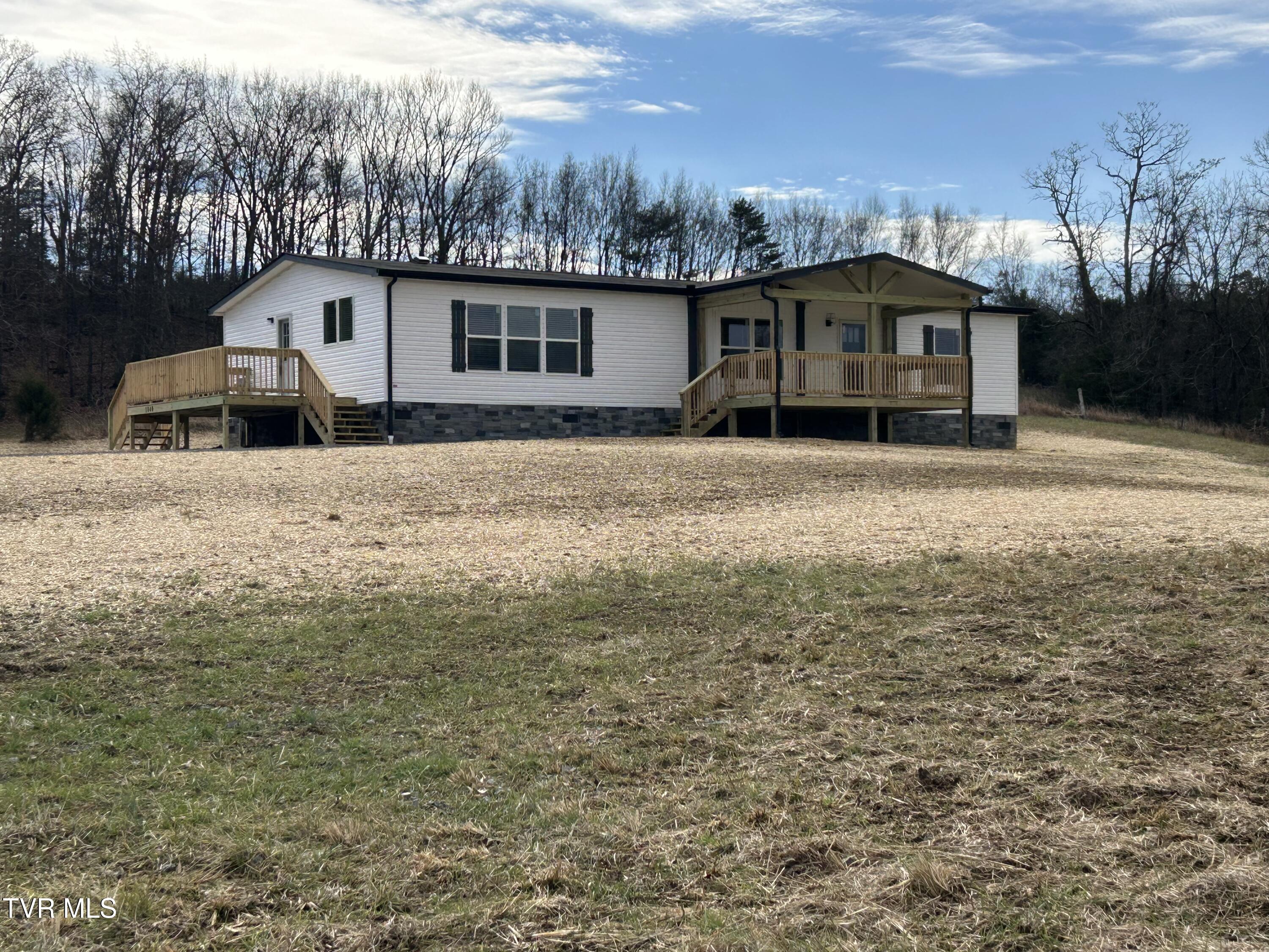 1040 Yellow Springs Road Midway, TN 37809 - Photo 1 of 47 IMG_4071