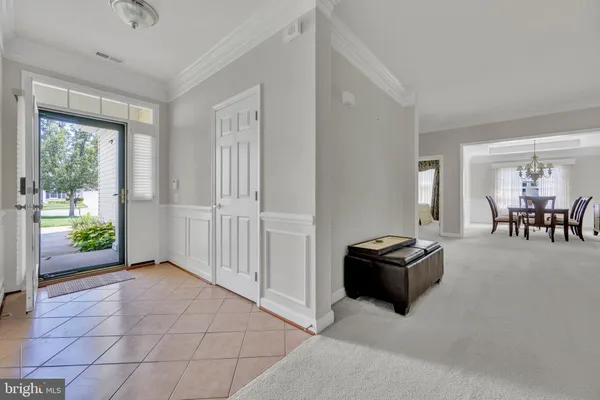 a livingroom with furniture and a window