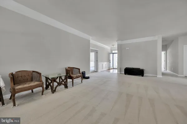 a view of a livingroom with furniture and a couch