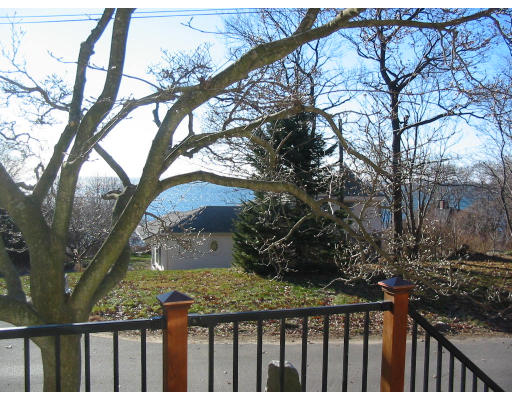 6 Old Salem Path Gloucester, MA 01930 - Photo 5 of 9 a view of a wooden fence and trees