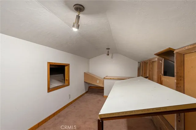 a view of storage and utility room