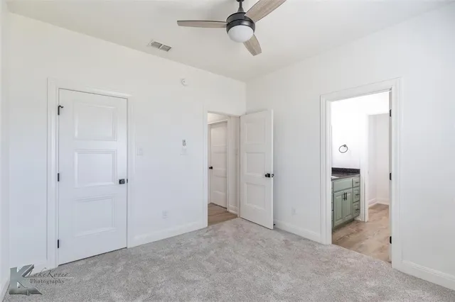 a view of a hallway with closet area
