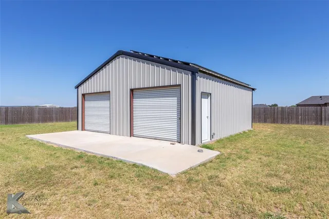 a view of a backyard of house