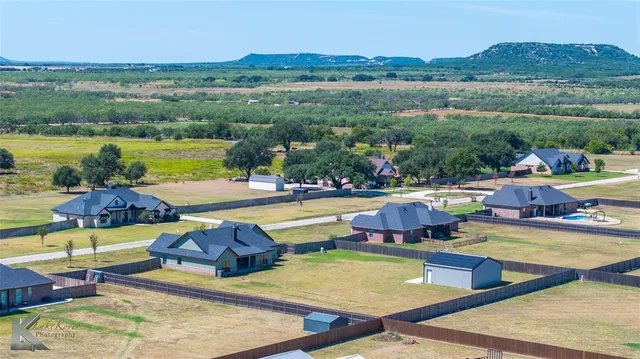a view of swimming pool with outdoor seating