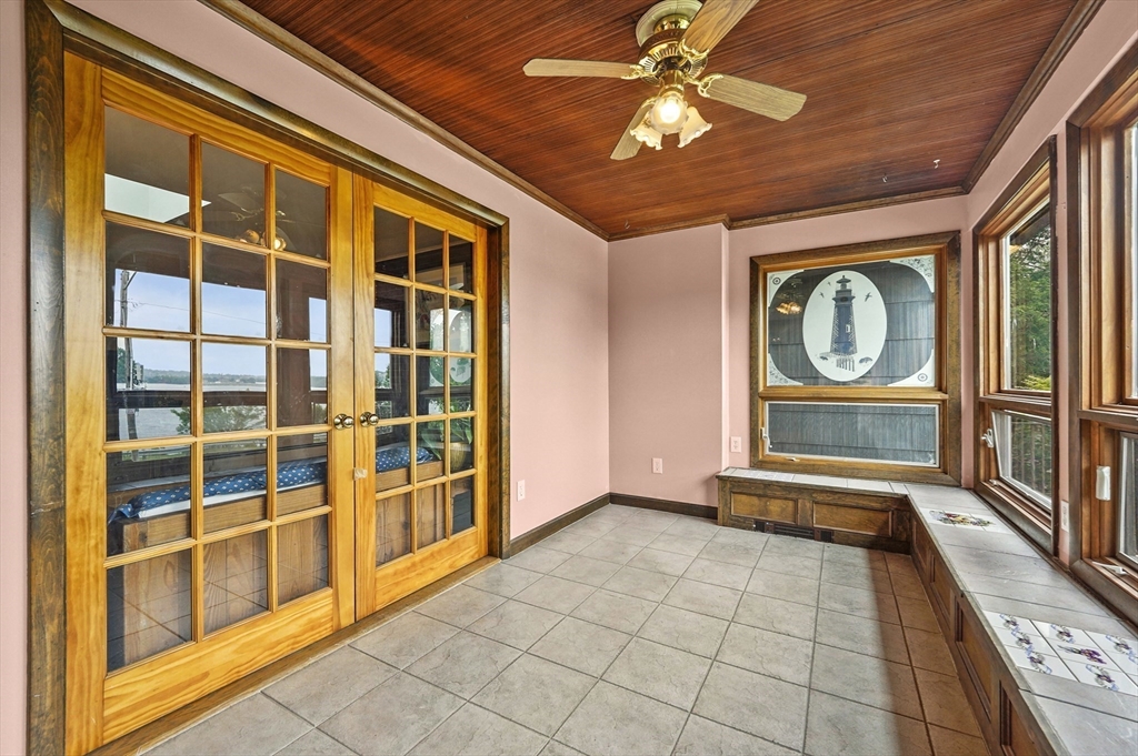 577 Grove Street Worcester, MA 01605 - Photo 12 of 39 a view of an entryway with a fireplace