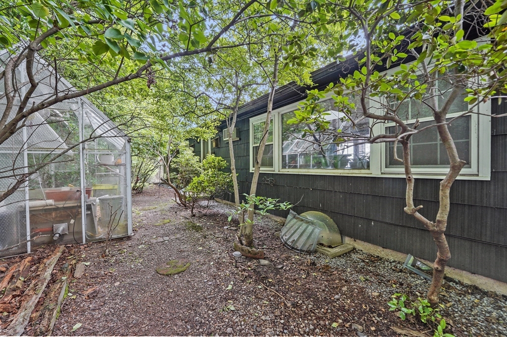 577 Grove Street Worcester, MA 01605 - Photo 33 of 39 a view of a chair and table in the backyard