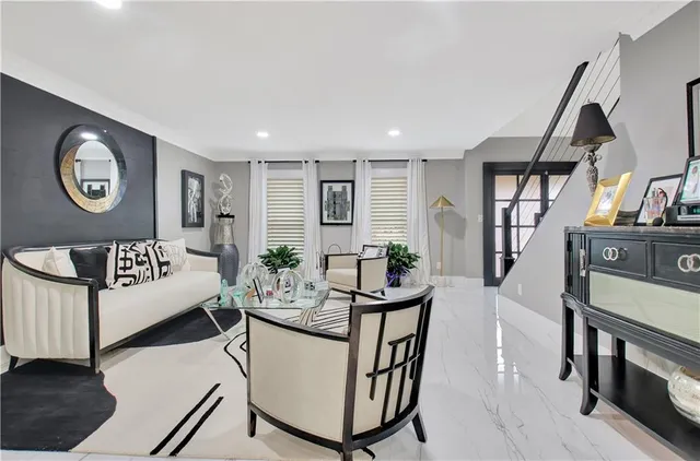 a white toilet sitting next to a shower curtain