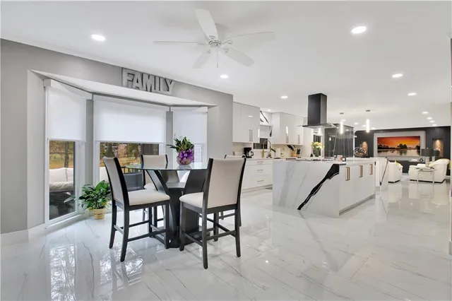 a bathroom with a sink vanity and a mirror