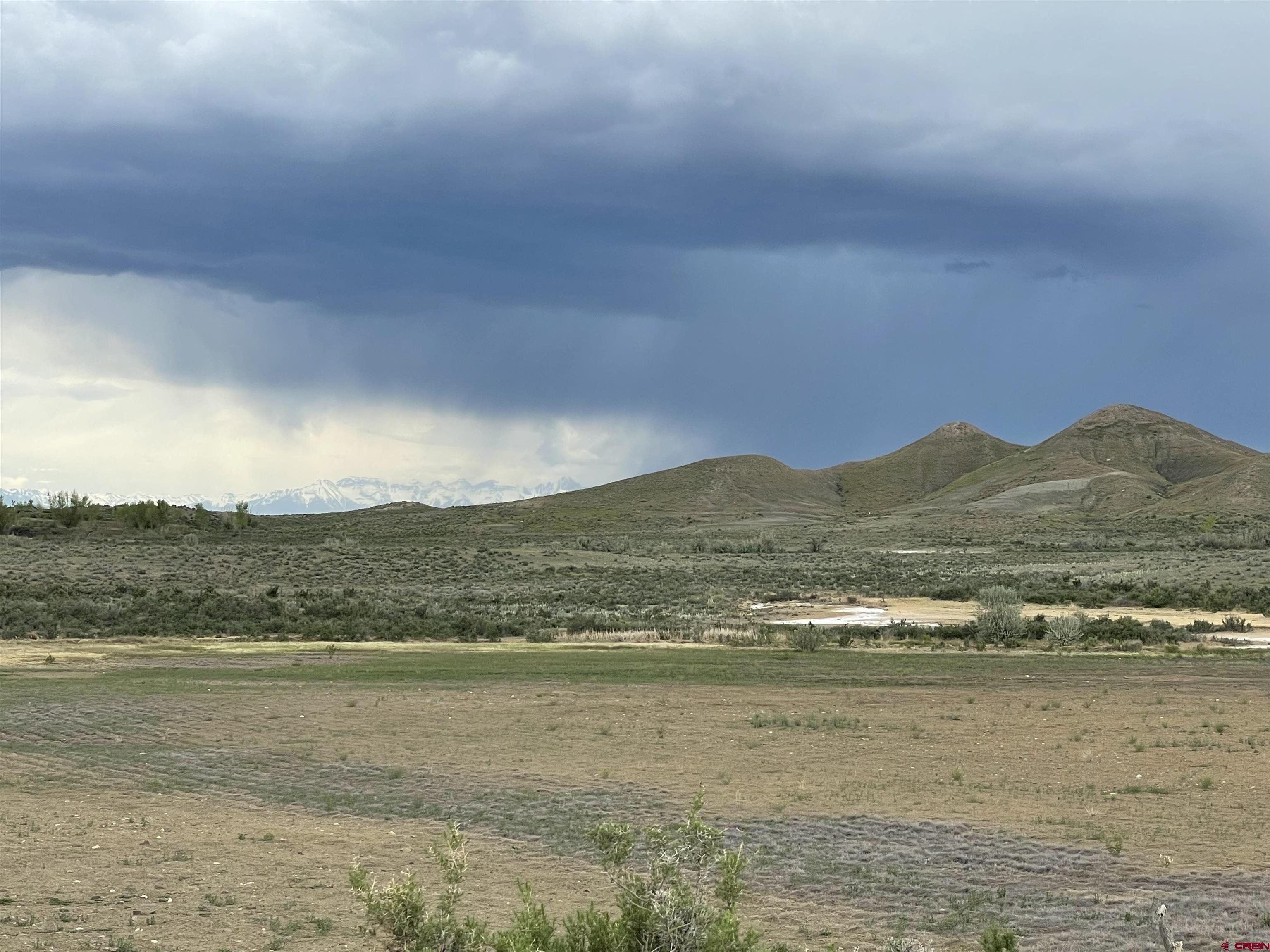 Lot 3 Jig Road Montrose, CO 81403 - Photo 3 of 9 a view of an ocean with a mountain