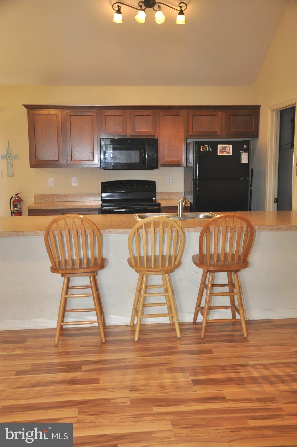 215 Gibson Road Inwood, WV 25428 - Photo 6 of 14 Kitchen with large breakfast bar