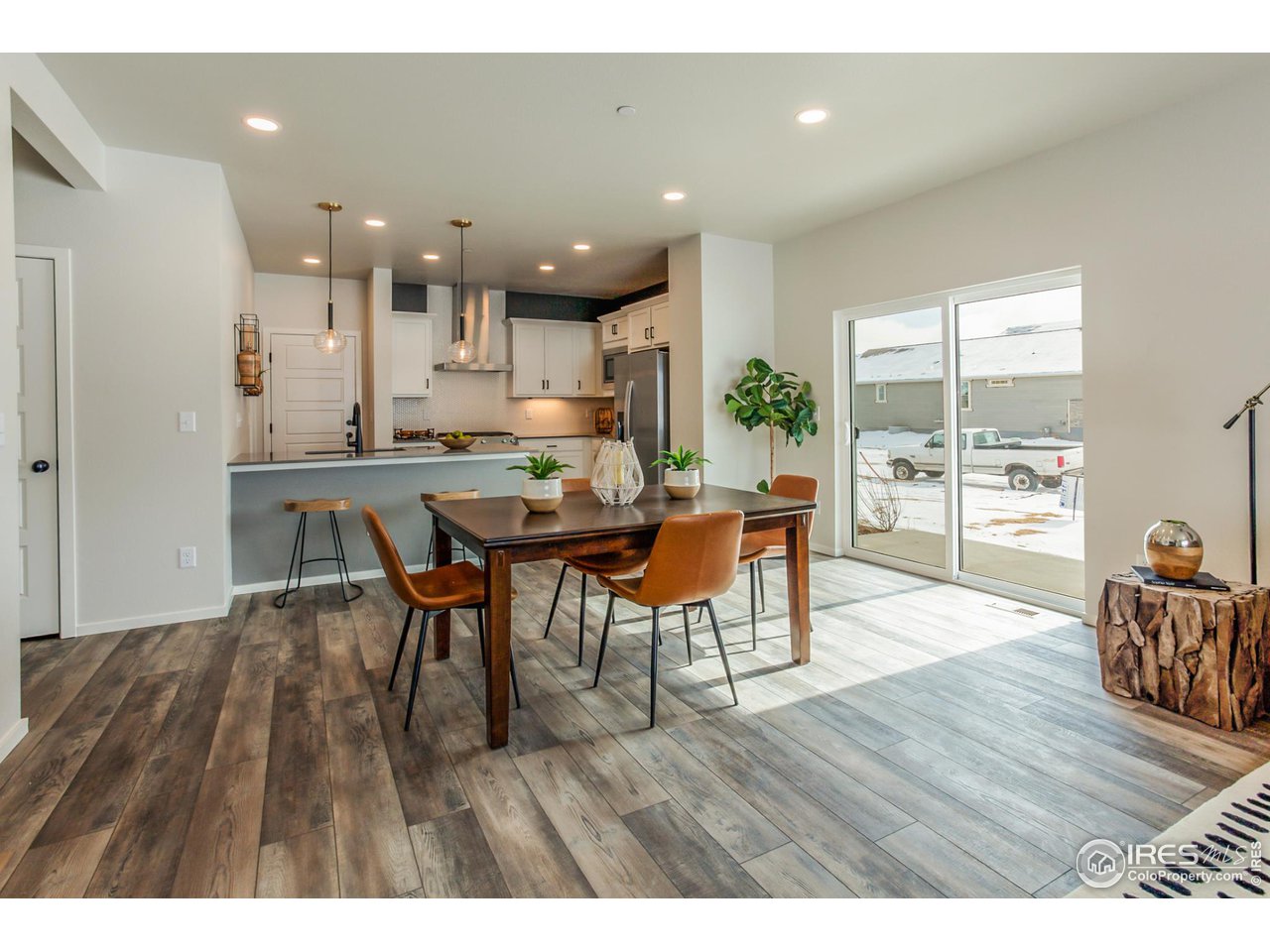 6931 4th St Road, Unit 4 Greeley, CO 80634 - Photo 7 of 34 EXAMPLE PHOTO: DINING ROOM AND KITCHEN